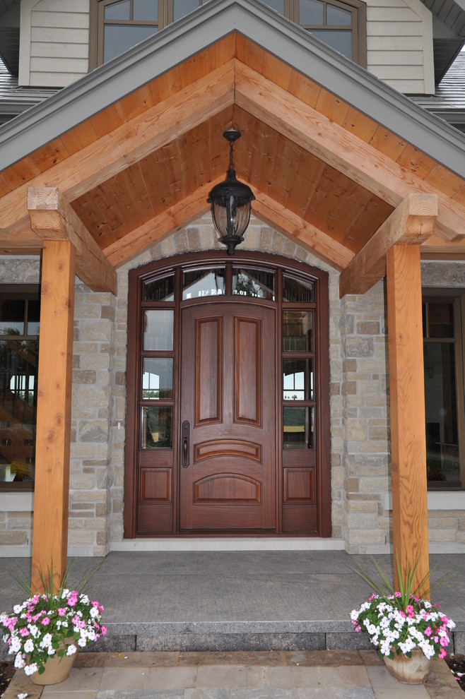 Photo of a traditional house exterior in Toronto.