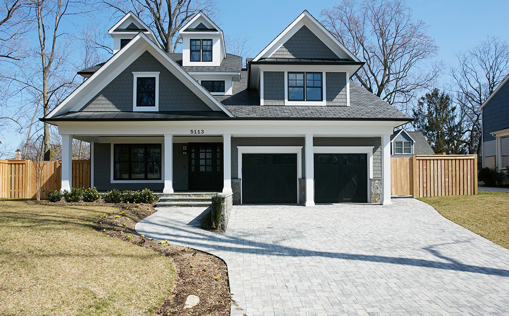Large craftsman gray three-story concrete fiberboard exterior home idea in DC Metro with a clipped gable roof