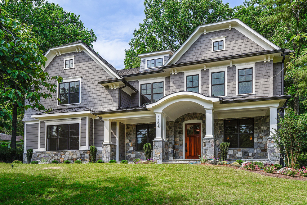 Photo of a large and gey classic two floor detached house in DC Metro with mixed cladding, a pitched roof and a shingle roof.