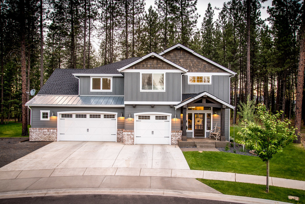 Inspiration for a large craftsman blue three-story concrete fiberboard exterior home remodel in Seattle