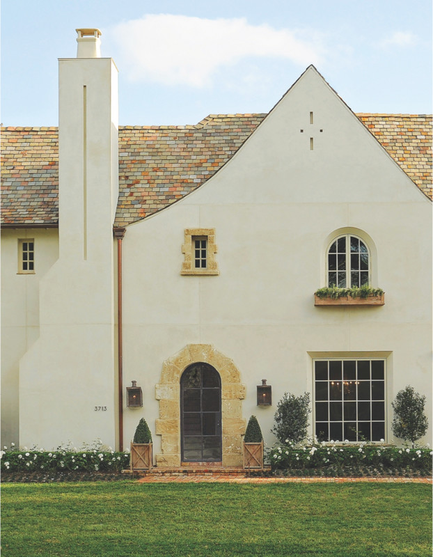 Photo of a beige and medium sized mediterranean two floor render house exterior in Other with a pitched roof.