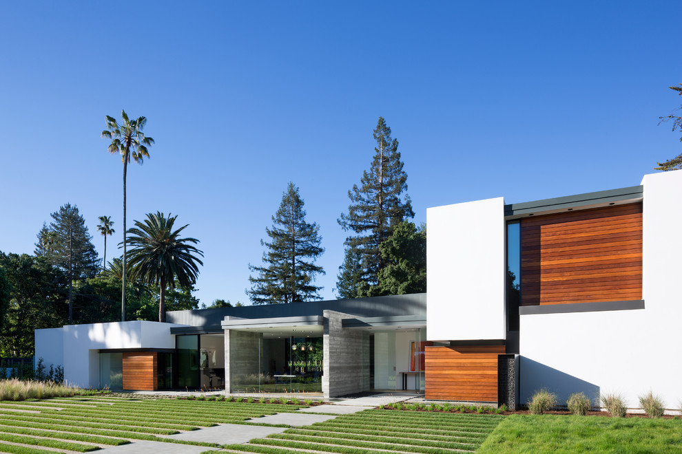Inspiration for a modern two-story glass exterior home remodel in San Francisco