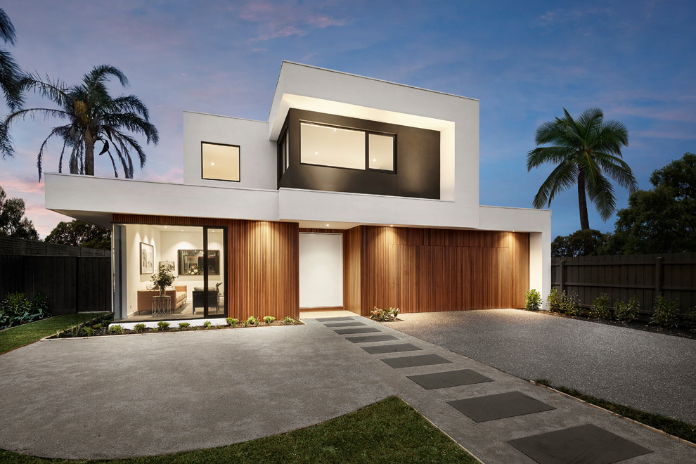 Inspiration for a white contemporary two floor detached house in Melbourne with a flat roof.