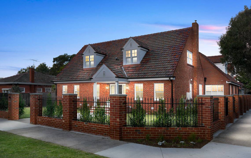 Design ideas for a large and red traditional two floor brick detached house in Melbourne with a pitched roof and a tiled roof.