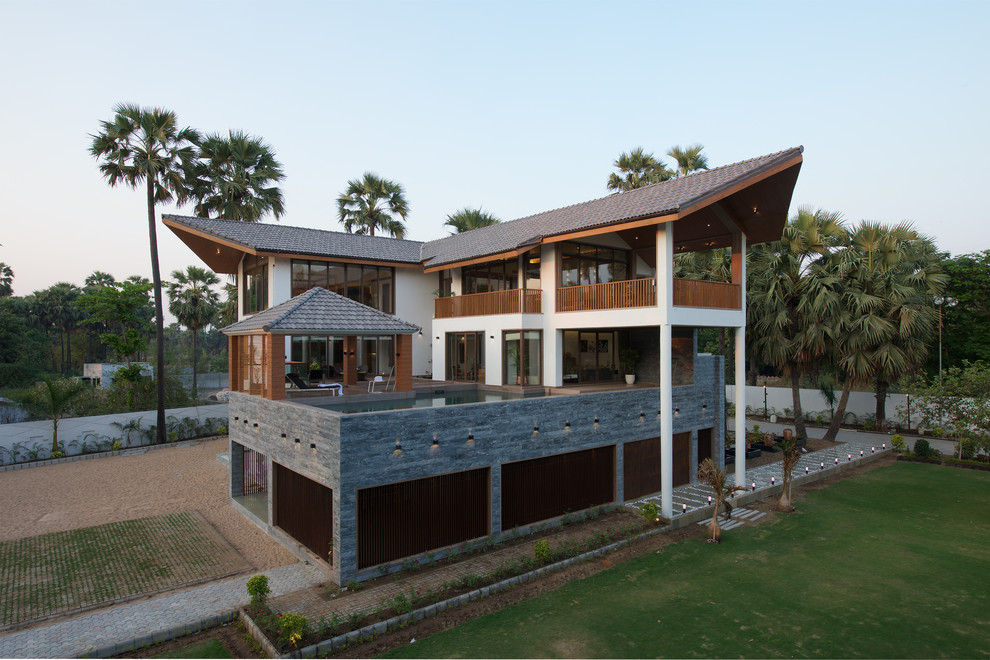 Asian exterior home idea in Ahmedabad