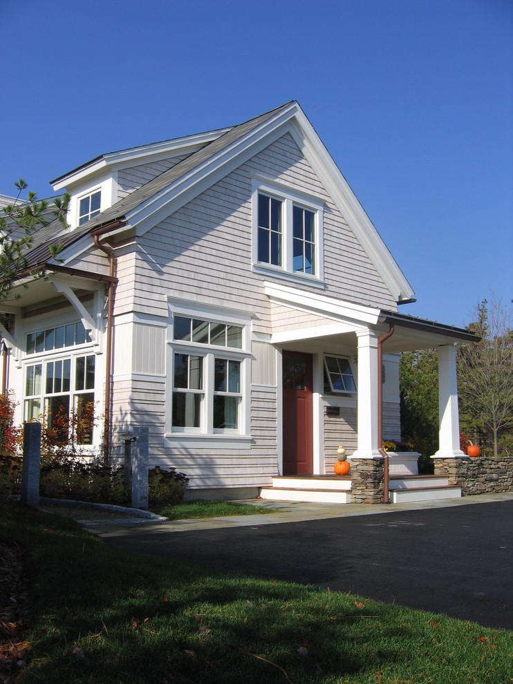 Inspiration for a small timeless gray two-story mixed siding gable roof remodel in Boston