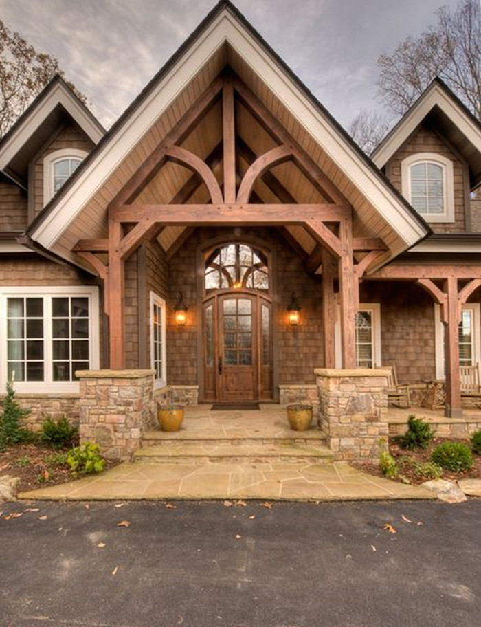 Large craftsman brown one-story wood exterior home idea in Charlotte
