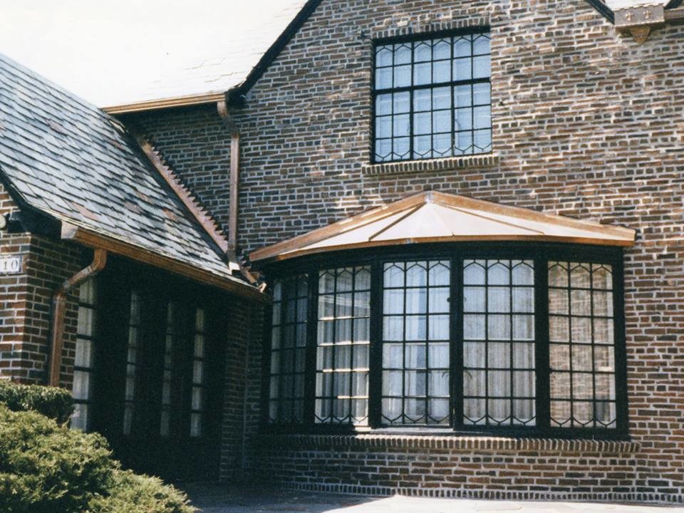 Idéer för att renovera ett mellanstort vintage brunt hus, med två våningar och tegel