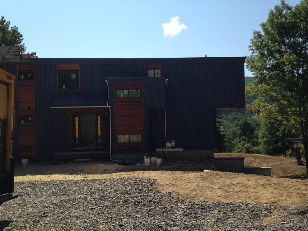 Galvanized steel gutters Modern House Exterior New York by