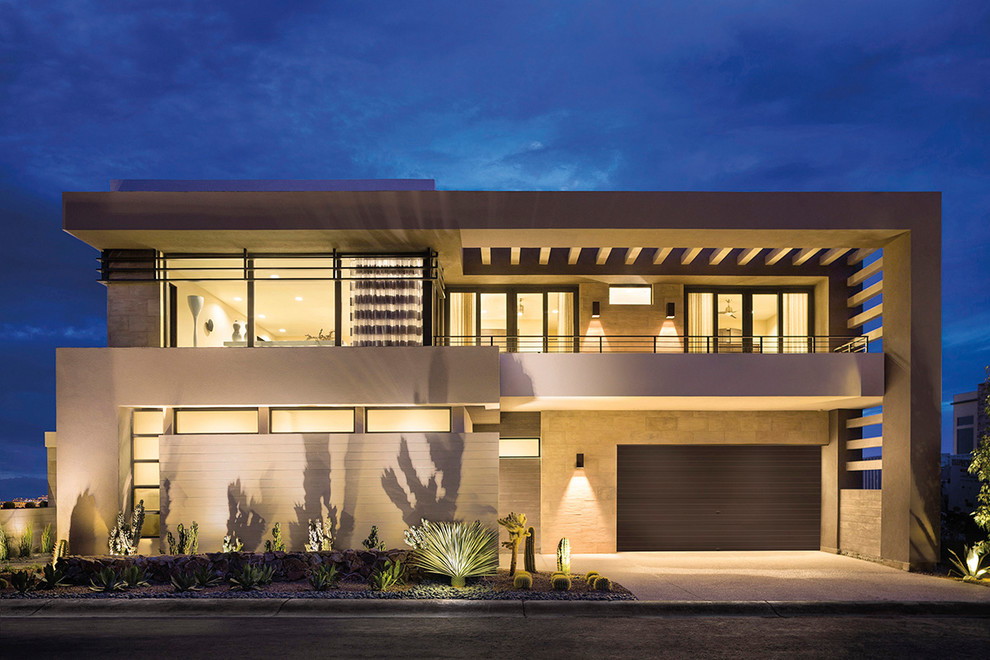Diseño de fachada de casa beige moderna grande de dos plantas con revestimiento de piedra y tejado plano