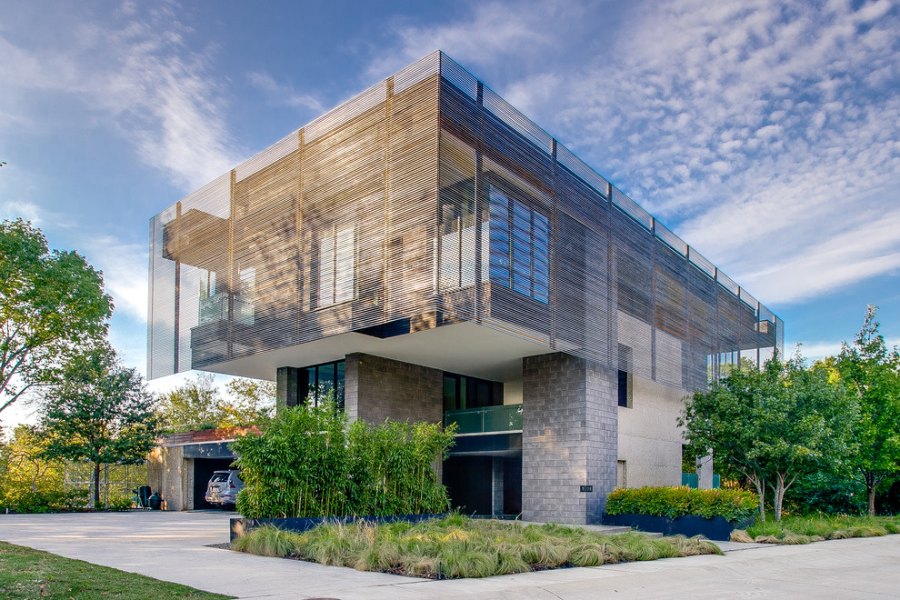 Contemporary three-story flat roof idea in Dallas