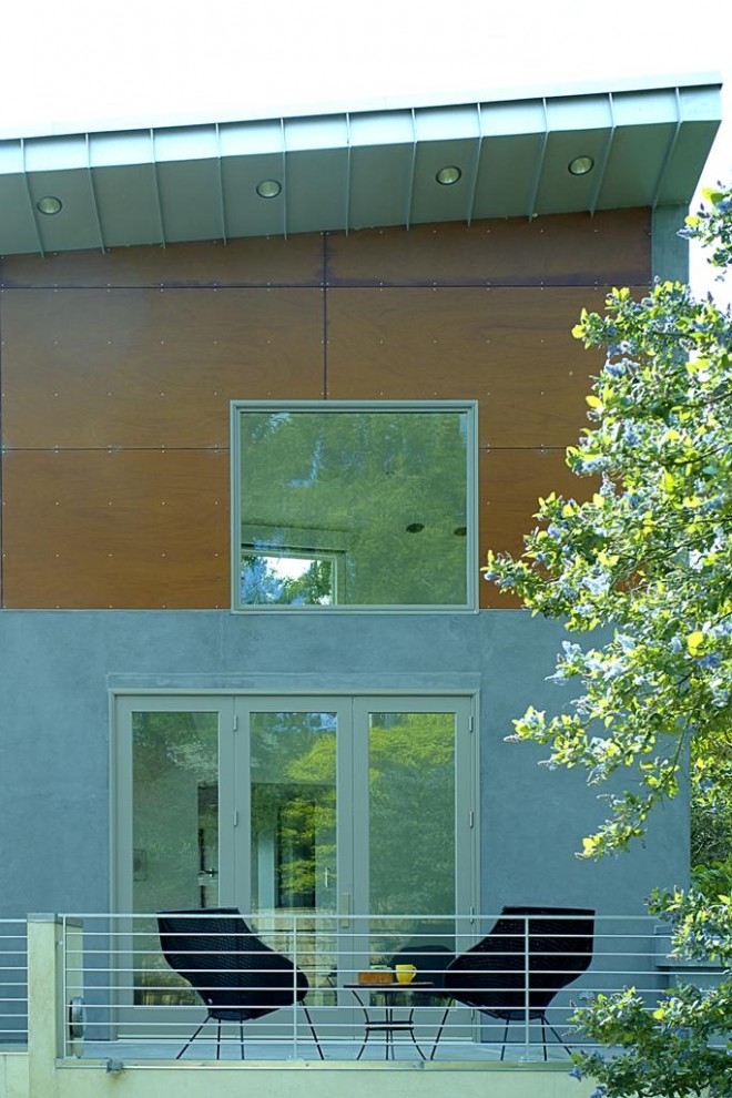 Immagine della facciata di una casa contemporanea a un piano