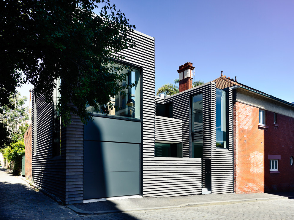 Contemporary two floor detached house in Melbourne with a metal roof.