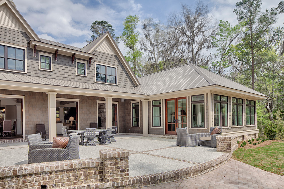 Example of a large classic gray two-story concrete fiberboard gable roof design in Atlanta