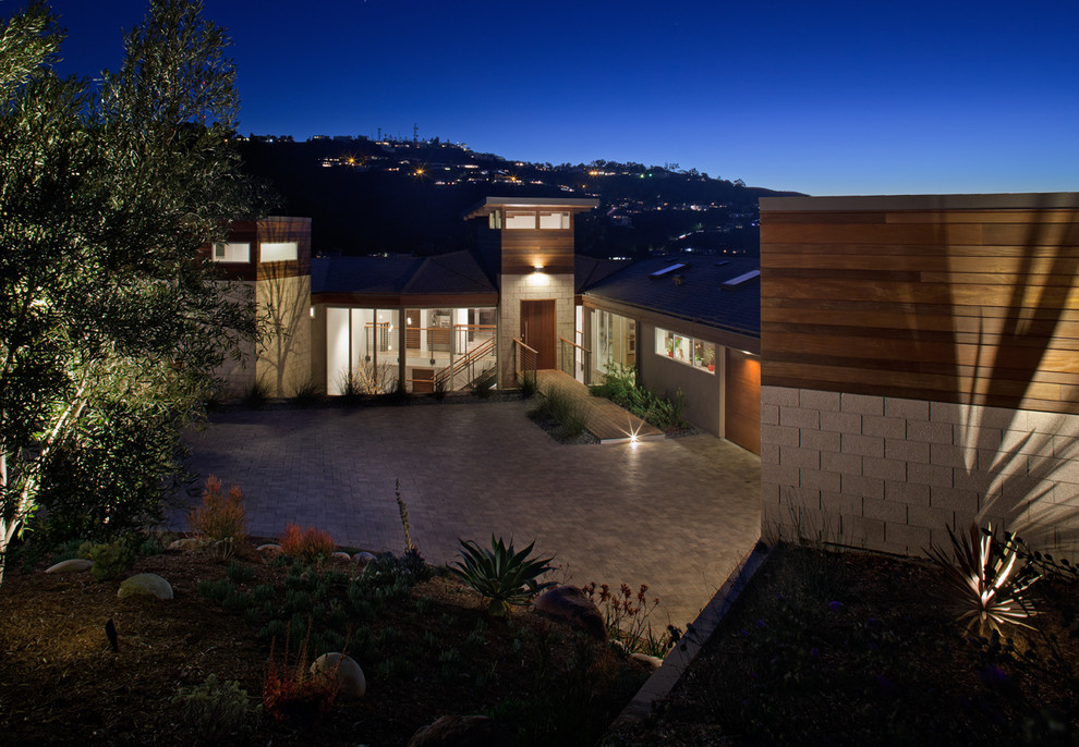 Inspiration for a contemporary mixed siding exterior home remodel in San Diego