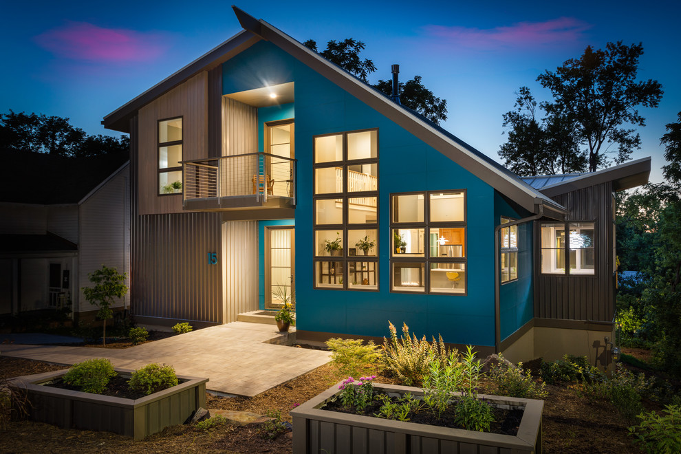 Modelo de fachada de casa azul contemporánea de dos plantas con tejado de metal