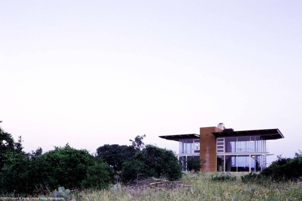 Glass Ranch House Industrial Exterior Austin by Jay Hargrave