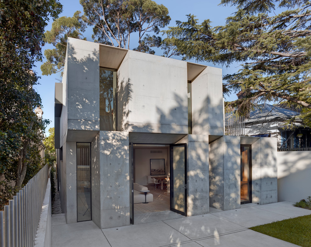 Contemporary concrete exterior home idea in Sydney