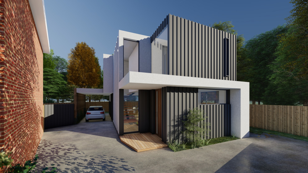 Mittelgroßes, Zweistöckiges Modernes Einfamilienhaus mit Metallfassade und schwarzer Fassadenfarbe in Melbourne