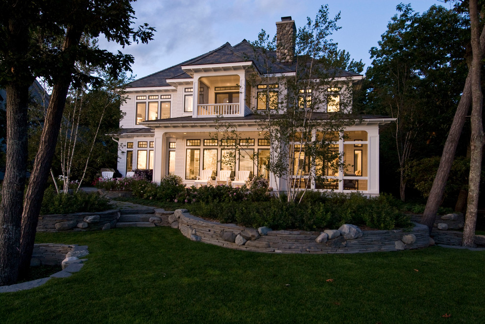 Example of a classic two-story exterior home design in Other