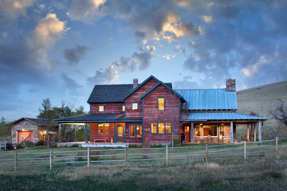 Inspiration for a red and large rural two floor detached house in Other with wood cladding, a pitched roof and a mixed material roof.