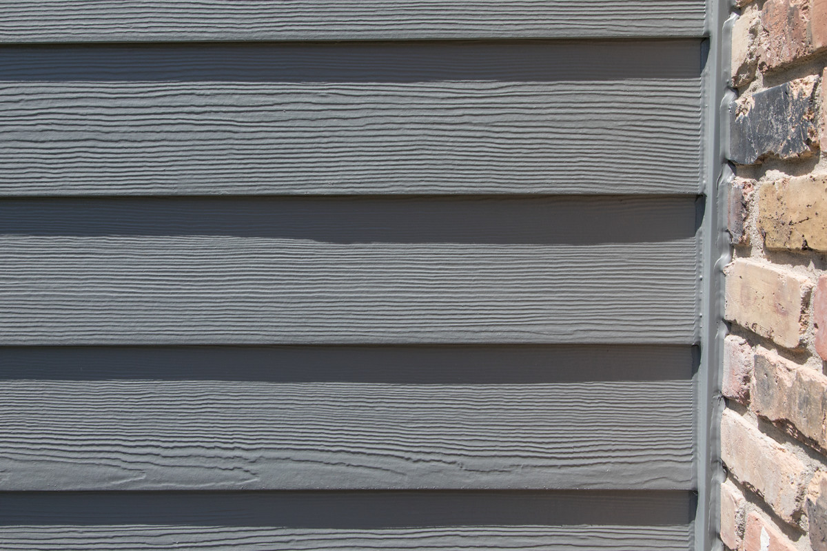 Gray Slate James Hardie siding installation in Naperville + New Roof