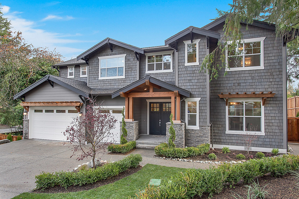 Inspiration for a large craftsman gray three-story mixed siding exterior home remodel in Seattle