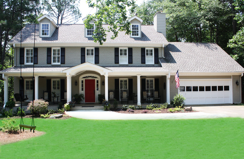 Large elegant gray three-story wood exterior home photo in Atlanta