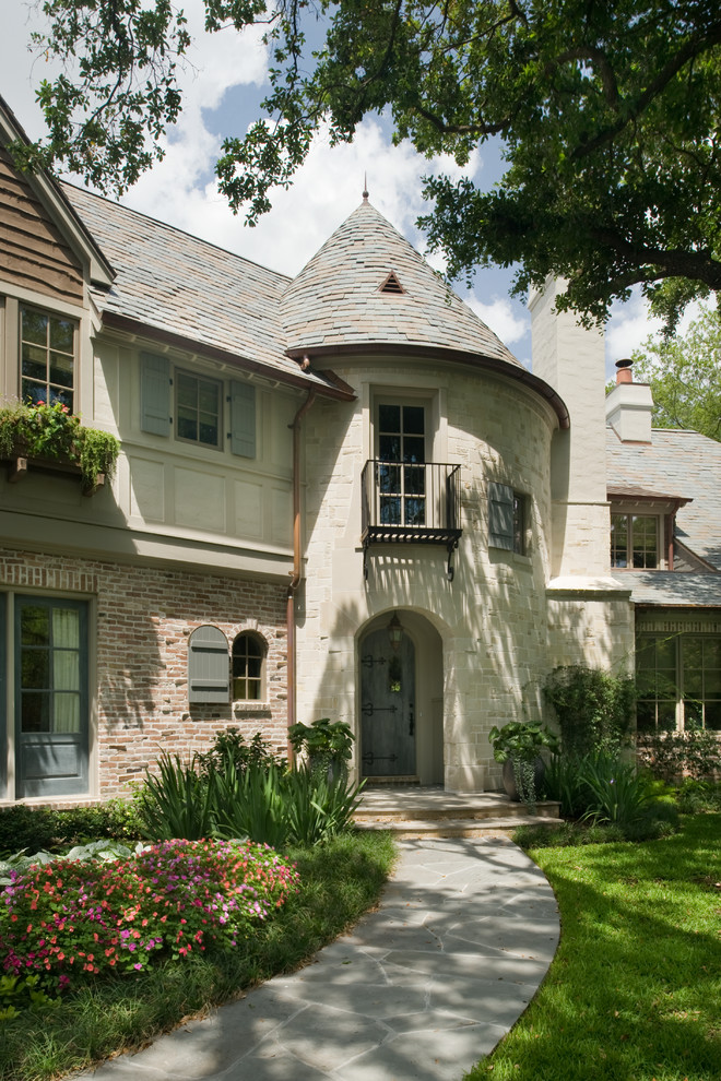 Traditional brick exterior home idea in Houston