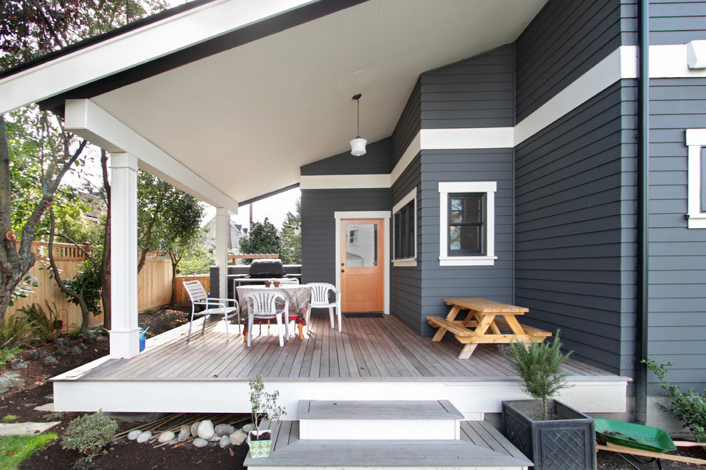 Inspiration for a mid-sized craftsman gray three-story wood exterior home remodel in Seattle with a shingle roof
