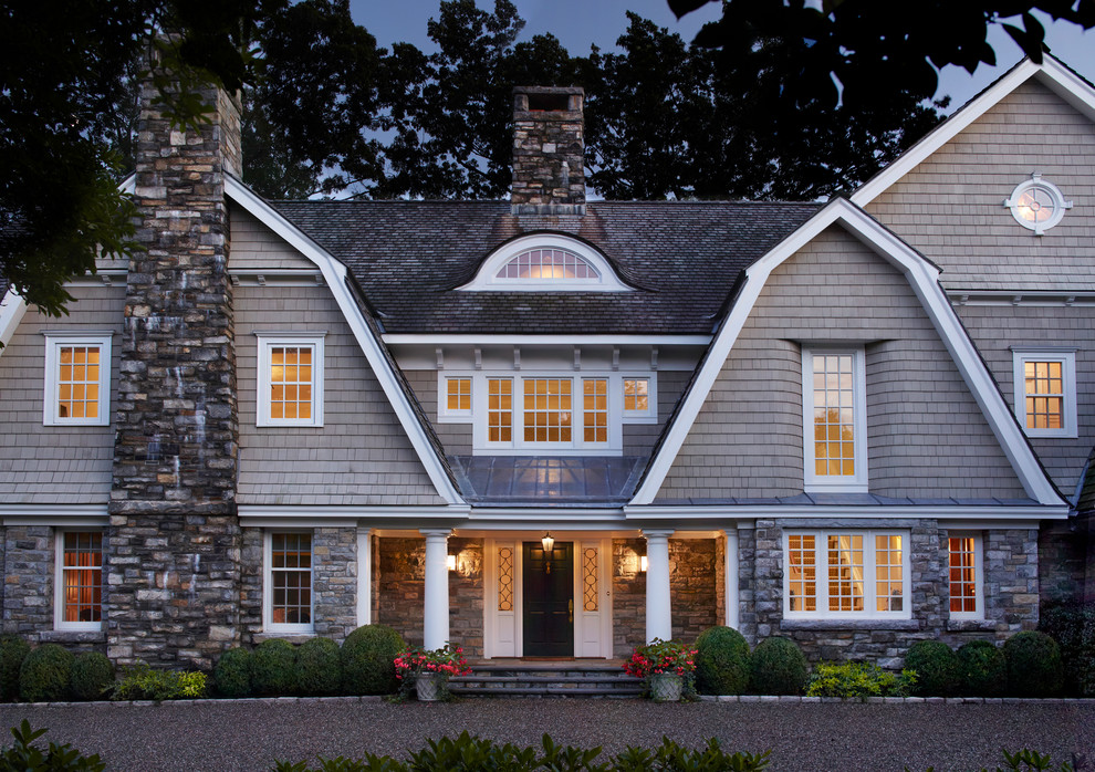 Coastal brown three-story wood exterior home idea in New York with a gambrel roof
