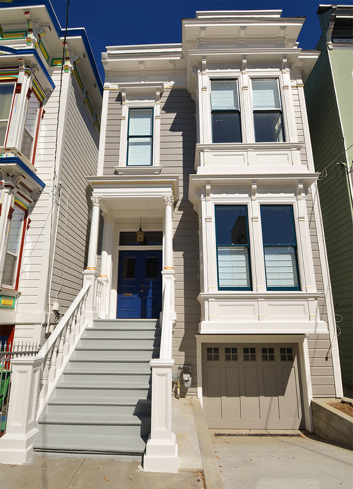 Inspiration for a gey victorian house exterior in San Francisco with three floors and wood cladding.