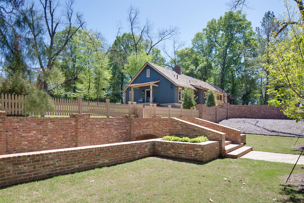 Example of a farmhouse exterior home design in Nashville