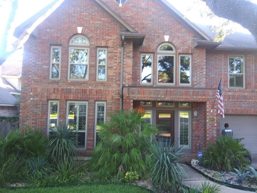 Gutter System Installation on Red Brick House in Kingsland, TX