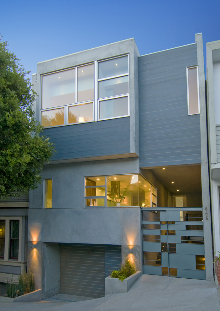 Свежая идея для дизайна: дом в стиле модернизм с облицовкой из бетона - отличное фото интерьера