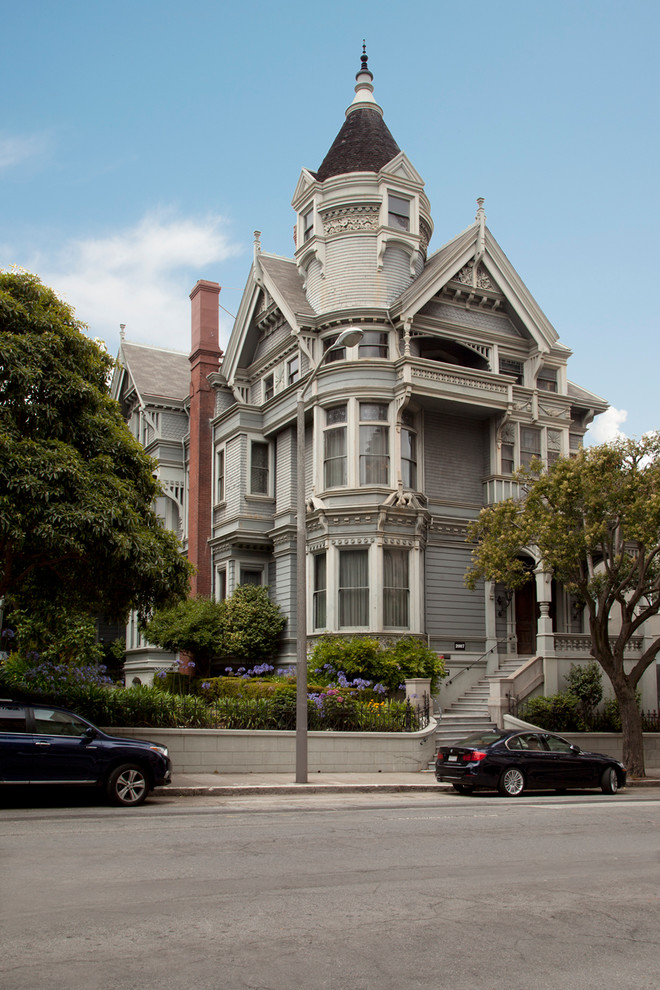 Example of an ornate gray three-story exterior home design in San Francisco