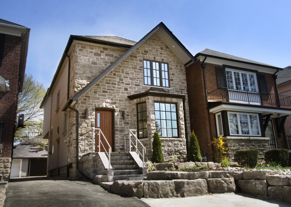 Photo of a traditional house exterior in Toronto.