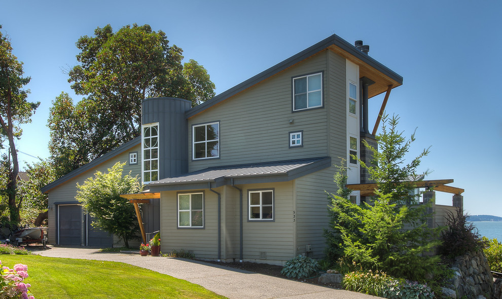 Example of a beach style exterior home design in Seattle