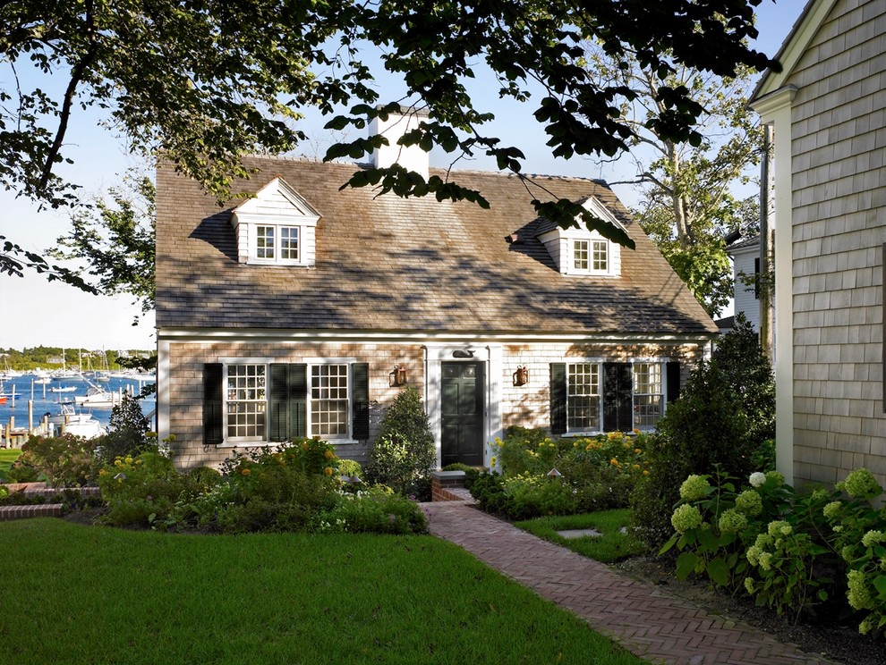 Inspiration for a coastal two-story wood exterior home remodel in Boston