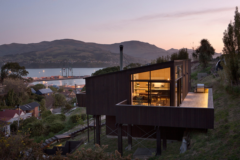 Contemporary two floor house exterior in Christchurch with wood cladding.