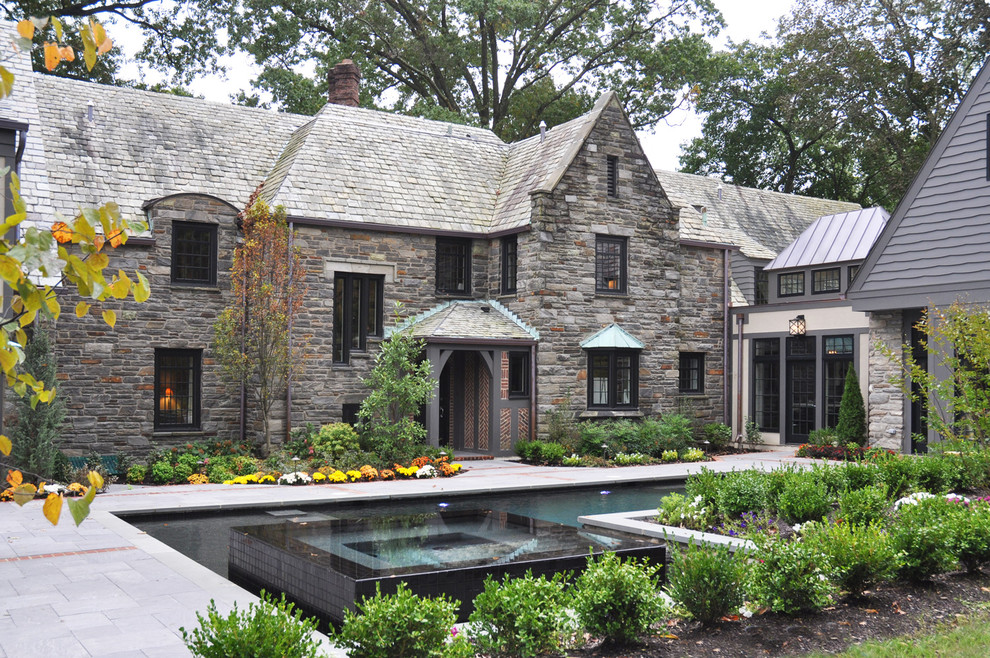 Classic two floor house exterior in Philadelphia with stone cladding.