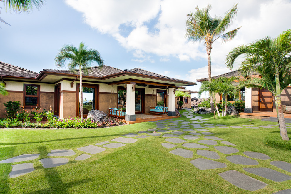 Inspiration for a world-inspired bungalow house exterior in Vancouver.