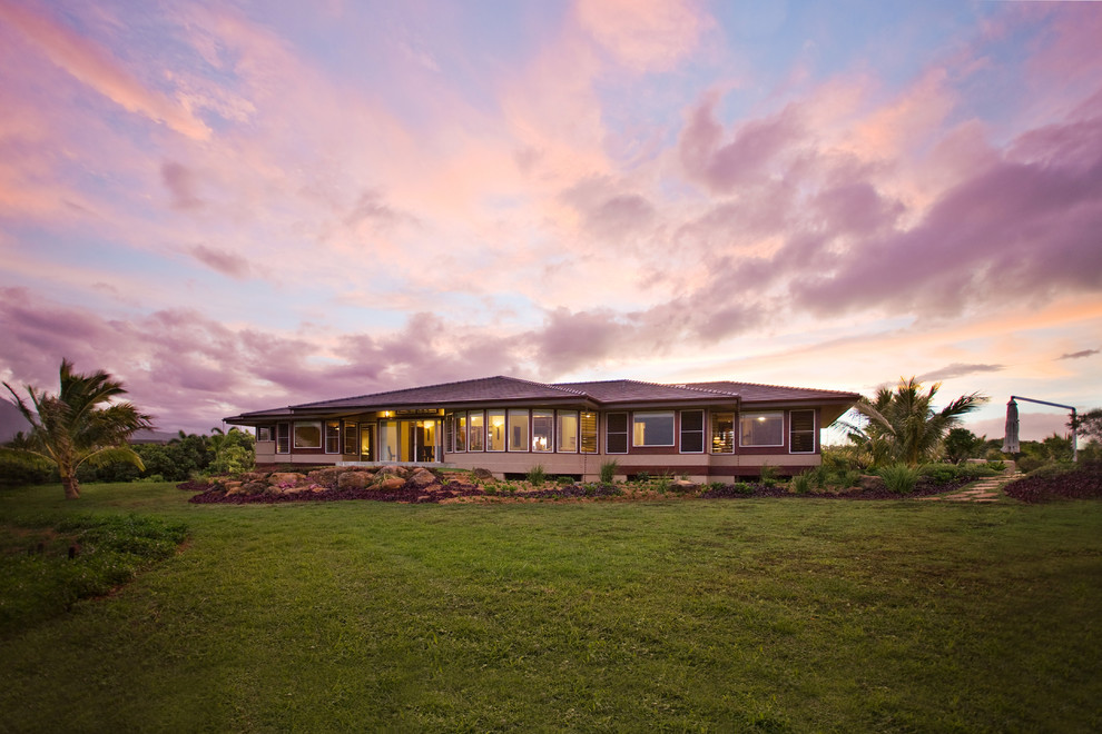 Inspiration for a world-inspired house exterior in Hawaii.