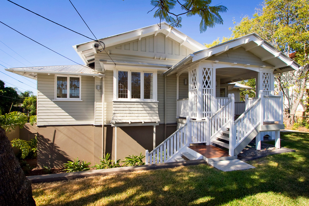 Inspiration for a large and gey traditional two floor detached house in Brisbane with wood cladding and a metal roof.