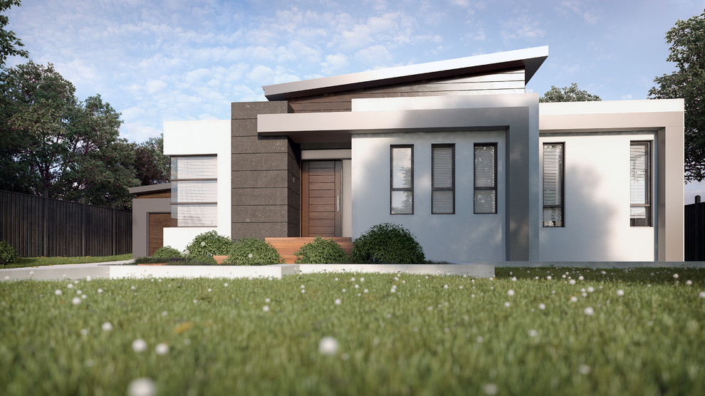 This is an example of a medium sized contemporary bungalow house exterior in Melbourne with mixed cladding.