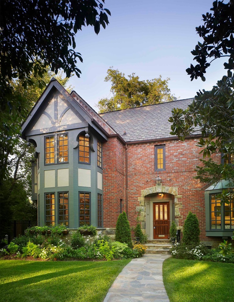 Mid-sized elegant three-story mixed siding gable roof photo in DC Metro