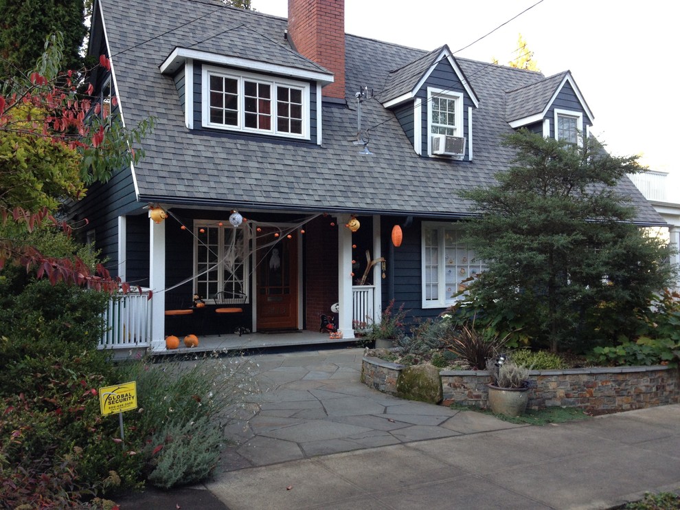 Design ideas for a large and gey traditional two floor house exterior in Portland with wood cladding.