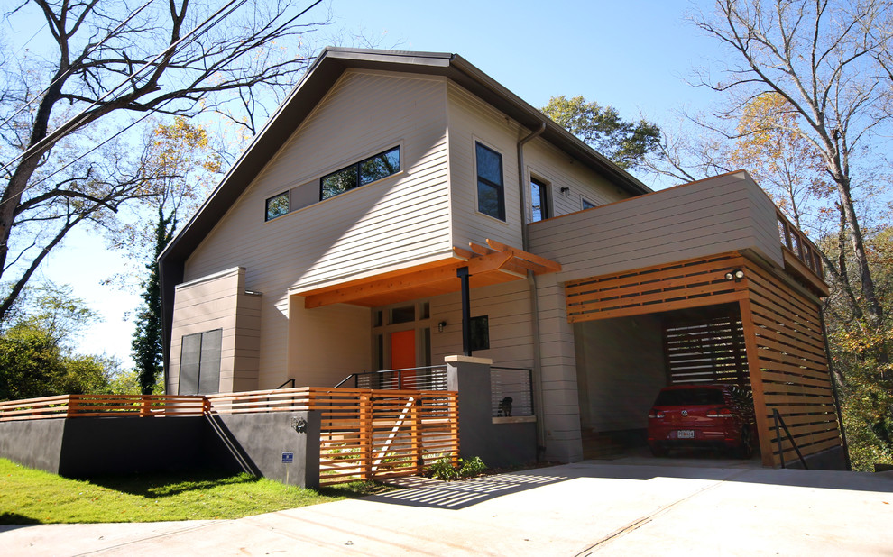 Photo of a gey contemporary two floor house exterior in Atlanta.