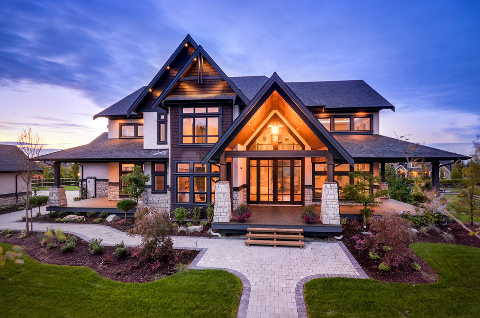 Large transitional two-story exterior home photo in Vancouver
