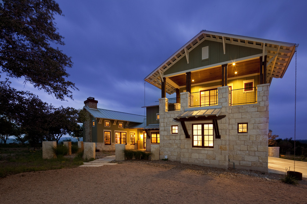 Example of a farmhouse two-story exterior home design in Austin